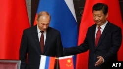 Владимир Путин жана Си Цзинпин.