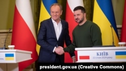 Президент України Володимир Зеленський та прем’єр-міністр Польщі Дональд Туск (зліва). Київ, 22 січня 2024 року