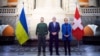 Президент України Володимир Зеленський (ліворуч), голова Національної ради Федеральних зборів Швейцарії Ерік Нуссбаумер (ц) та голова Ради кантонів Єва Герцог (п), Берн, 15 січня 2024 року