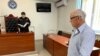 Судья Ильязбек Тажыбаев жана Өндүрүш Токтонасыров. Бишкектин Биринчи май райондук соту. 19-июнь, 2024-жыл.