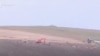 Armenia - Azerbaijani troops dig trenches outside Tegh village.