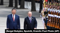 Си Цзинпин жана Владимир Путин. 