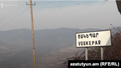 Armenia- A oad sight at the entrance to Voskepar village in Tavush region.