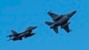 Літаки F16 в Румунії, де розпочав роботу Європейський навчальний центр, в якому передбачене тренування також українських авіаторів. 13 листопада 2023 року