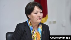 Догдуркүл Кендирбаева.