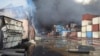 Containers burn on April 27 at the site of a massive explosion and fire that rocked a port near the southern port city of Bandar Abbas, Iran.
