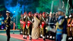 Saudi Arabia's Crown Prince Muhammad bin Salman (center) reviews a Pakistani guard of honor during a welcoming ceremony in Islamabad on February 17. 