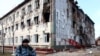 Одна з будівель у Грозному, пошкоджена після боїв 4 грудня 2014 року