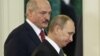 Президенти Булорусі та Росії Олександр Лукашенко (л) і Володимир Путін. У цих країнах у неділю відбулися масові акції протесту