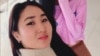 Aizada Kanatbekova was found dead in a car. 