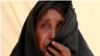 O persoană relocată forțat în urma atacurilor talibanilor din provincia Kandahar.