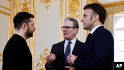 Ukrainian President Volodymyr Zelenskyy, French President Emmanuel Macron, and British Prime Minister Keir Starmer at the "coalition of the willing" summit. 