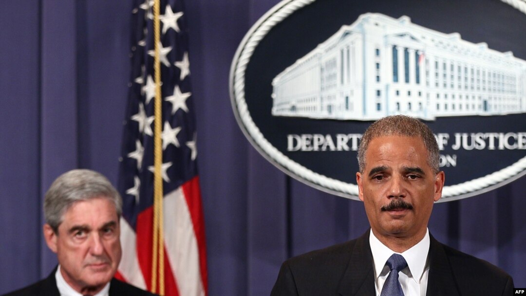 Attorney General Eric Holder (right) and FBI Director Robert Mueller at a news conference in Washington on October 11 announcing details of the alleged assassination plot targeting the Saudi ambassador.