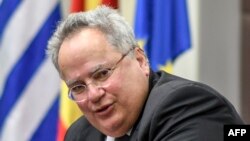 Шефот на грчката дипломатија, Никос Коѕијас за време на посетата на Скопје на 23 март, годинава