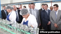 Nagorno-Karabakh - Armenian Prime Minister Tigran Sarkisian (C) visits a food-processing plant in the Askeran district, 1Aug2011.