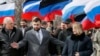 Лидер боевиков Денис Пушилин и депутат российской Думы Наталья Поклонская на мероприятиях в Макеевке, март 2019 года