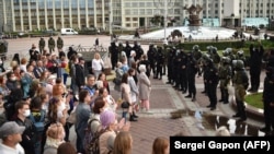 Карэспандэнты Радыё Свабода Алег Грузьдзіловіч і Андрэй Рабчык незадоўга да затрыманьня