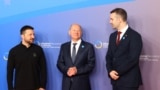 Президент України Володимир Зеленський, тогочасний канцлер Німеччини Олаф Шольц та прем'єр-міністр Чорногорії Мілойко Спаїч (крайній справа). Берлін, Німеччина, червень 2024 року