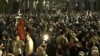 Georgians Continue Pro-Democracy Protests While Commemorating Independence Vote