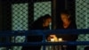 Kosovo -- Some Pristina citizens lit candles on their balconies and terraces in memory of those killed during the 1998-99 war in Kosovo, January 15, 2021.