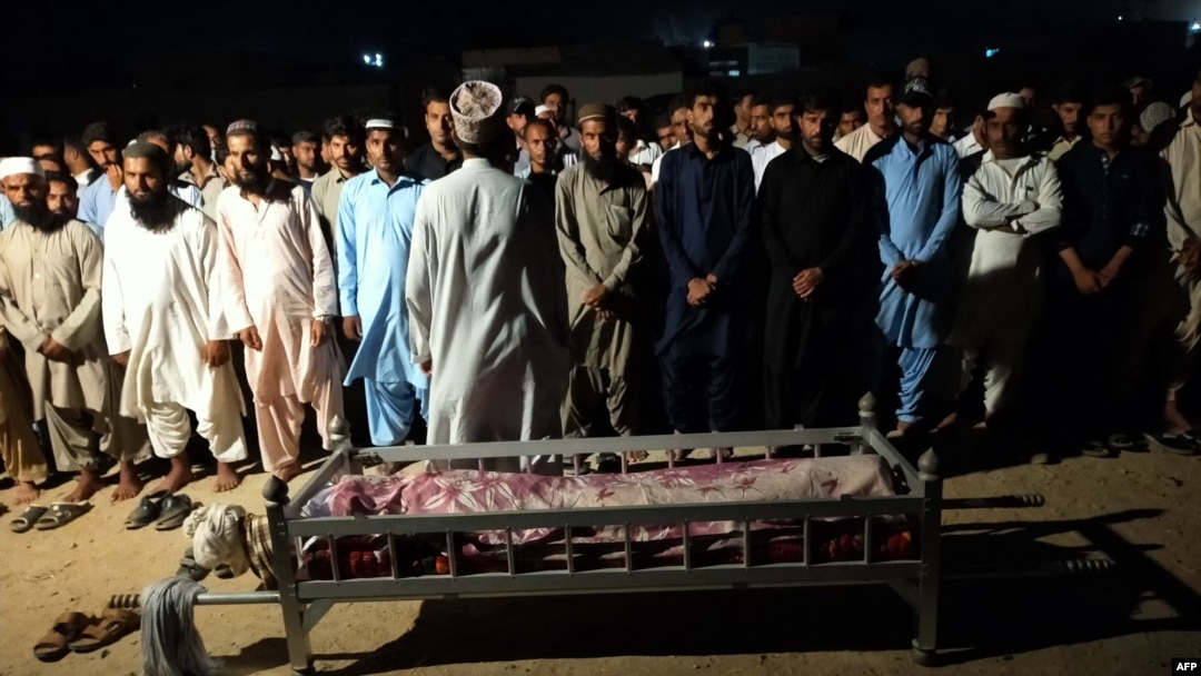 Locals from Gwadar attend the funeral for a victim of the August 20 attack claimed by the Balochistan Liberation Army (BLA).
