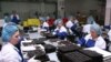 Armenia -- Workers at a candy factory in Yerevan.