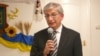  Євген Чолій виступає перед українською громадою в Будапешті