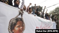 People shout slogans as they protest the release of Asia Bibi, a Christian accused of blasphemy, whose death sentence was annulled by the Supreme Court in Lahore in November 2018.