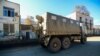 NAGORNO-KARABAKH -- An Azeri military truck drives along a street in the town of Hadrut, November 25, 2020