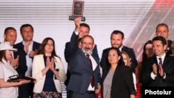 Armenia - Former Prime Minister Nikol Pashinian and senior members of his Civil Contract Party celebrate their election victory at a rally in Yerevan, June 21, 2021.