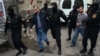 Armenia - Zhirayr Sefilian (L) and another detained leader of the Founding Parliament movement are taken to the Investigative Committee for further questioning, Yerevan, 9Apr2015.