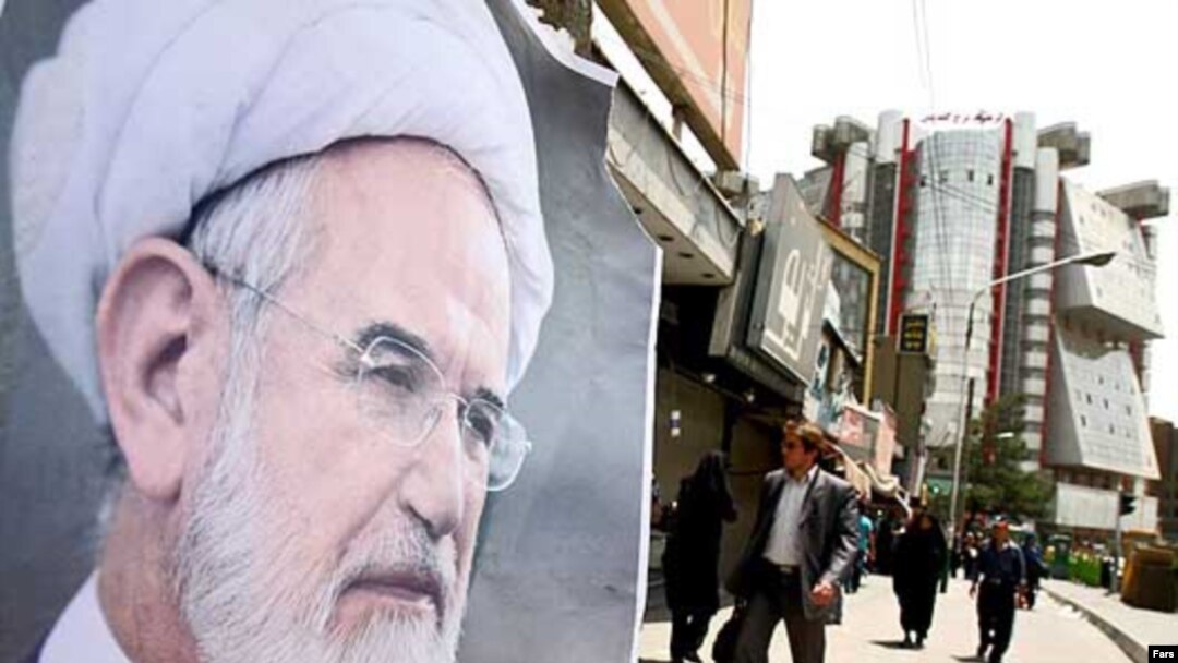 Posters of presidential candidate Mehdi Karrubi in Tehran in late May