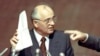 ** FILE ** Soviet President Mikhail Gorbachev, left, holds notes given to him by Russian Federation President Boris Yeltsin, right, during a special session of the Russian Federation Parliament in this Friday, August 23, 1991, file photo. Yeltsin, who en