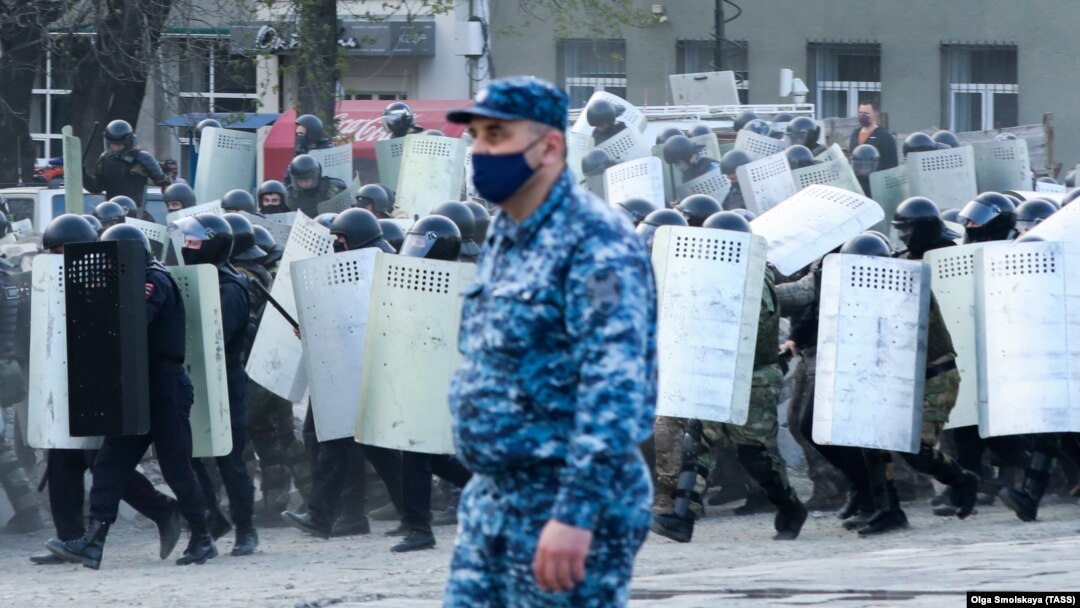 Riot police confront participants of a rally against the lockdown in Vladikavkaz on April 20.